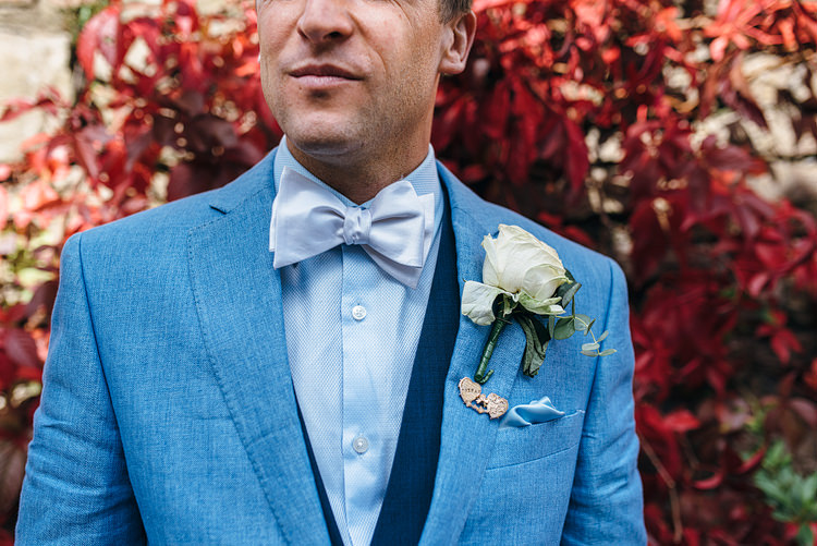 Bow Tie Groom Blue Jacket Rose Buttonhole Stylish Relaxed Secret Garden Wedding http://www.gregcoltmanphotography.com/