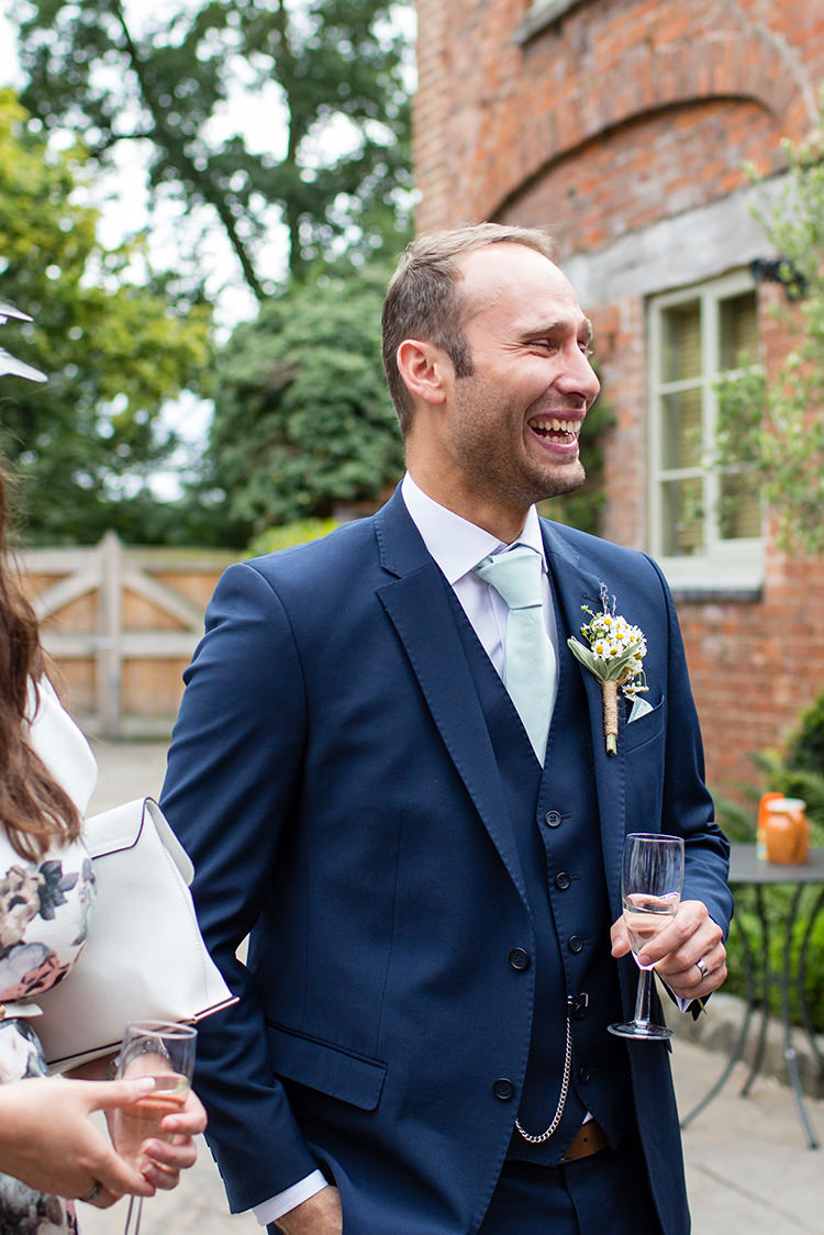 Navy Suit Groom Pretty Natural Floral Barn Wedding http://www.johastingsphotography.co.uk/