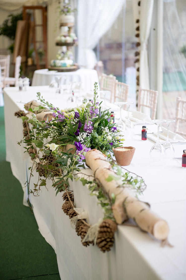 Top Table Flowers Log Green Purple Rustic Woodland Glade Wedding http://razzleberryphotography.co.uk/