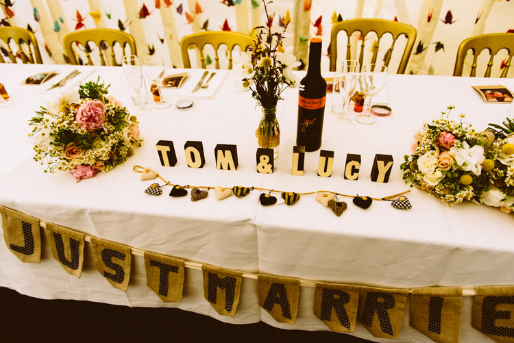 Top Table Names Bunting Hessian Flowers Eclectic Crafty Village Hall Wedding http://www.edgodden.co.uk/