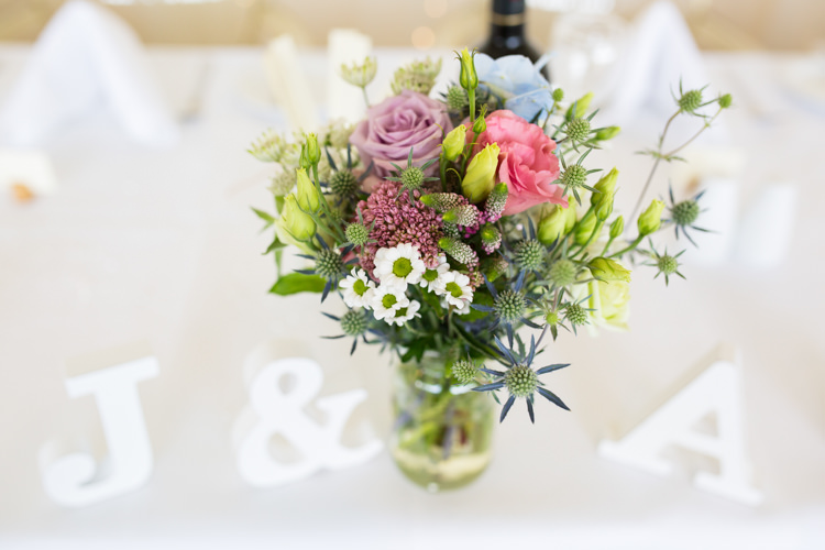 Jar Flowers Pink Blue Pretty Fresh Summer Wedding http://www.charlotterazzellphotography.com/