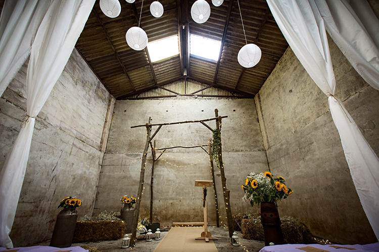 Ceremony Barn Backdrop Arch Lanterns Fabric Home Made Farm Tipi Wedding http://alexabbottphotography.co.uk/