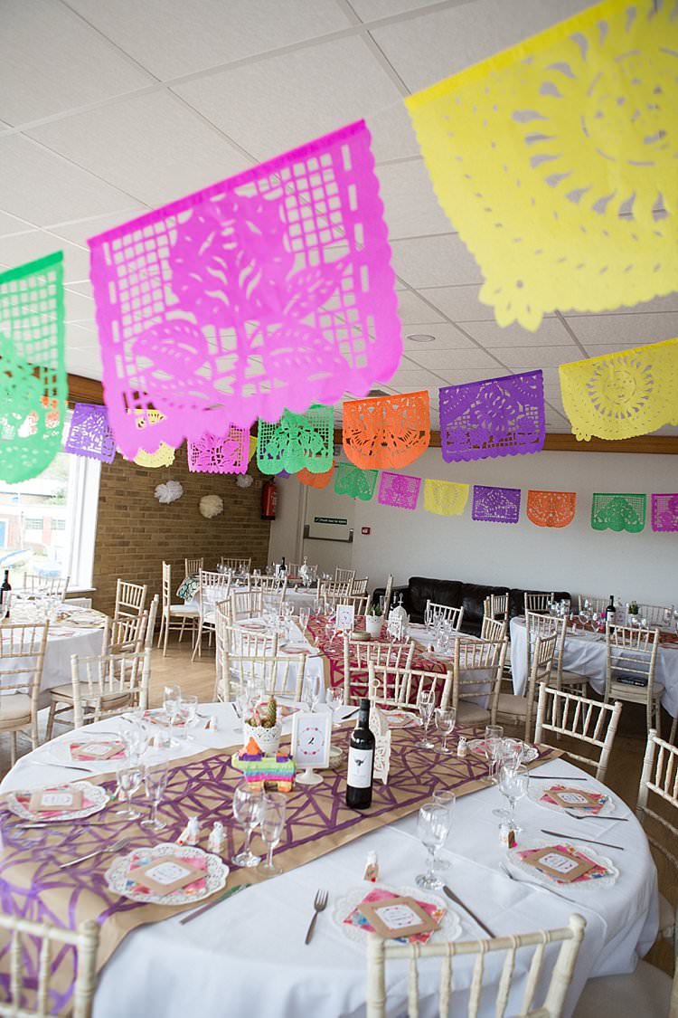 Flag Bunting Decor Bright Fresh Mexican Inspired Wedding http://www.photographybykatie.co.uk/