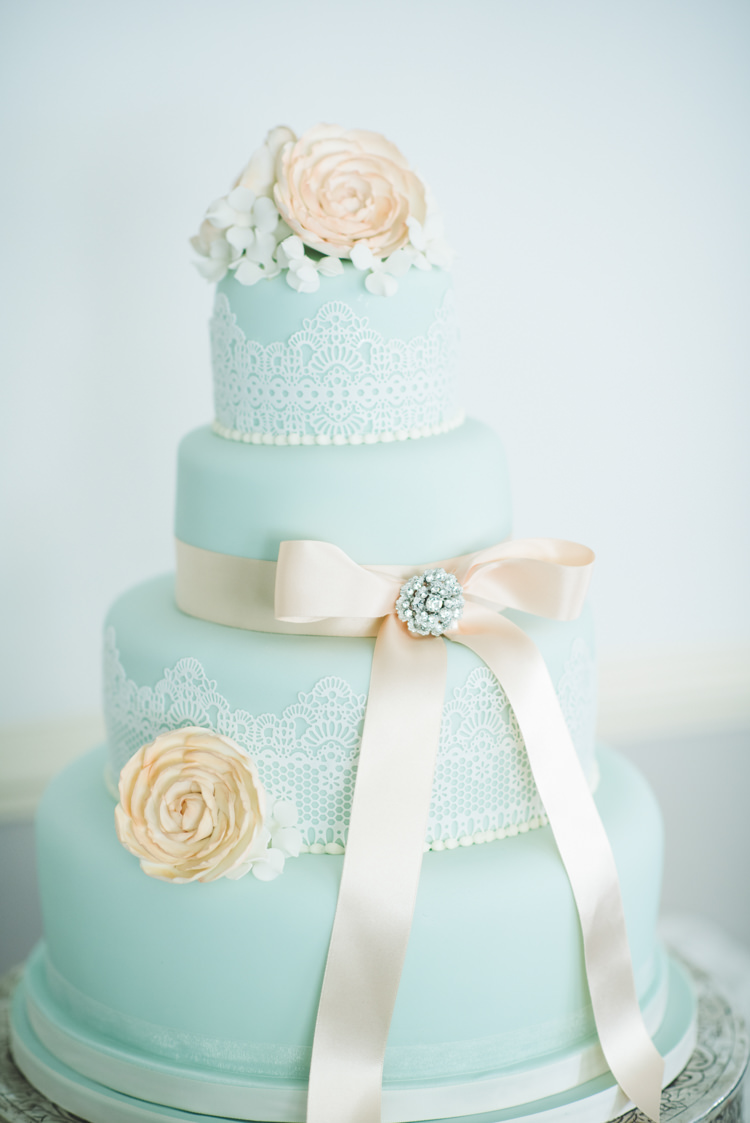 Cake Iced Pale Plue Delicate Ribbon Flowers Pretty Pastel Sparkly Wedding https://www.georgimabee.com/
