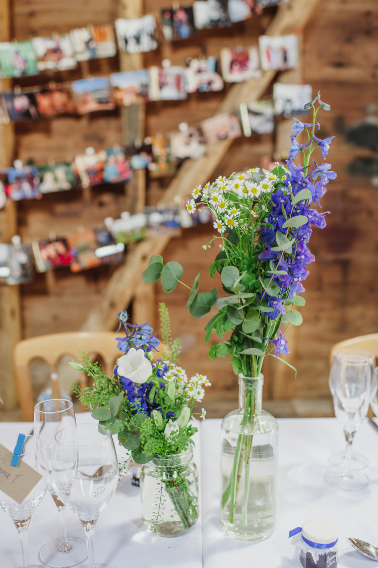 Bottle Flowers White Pretty Blue Country Barn Spring Wedding http://karenflowerphotography.com/