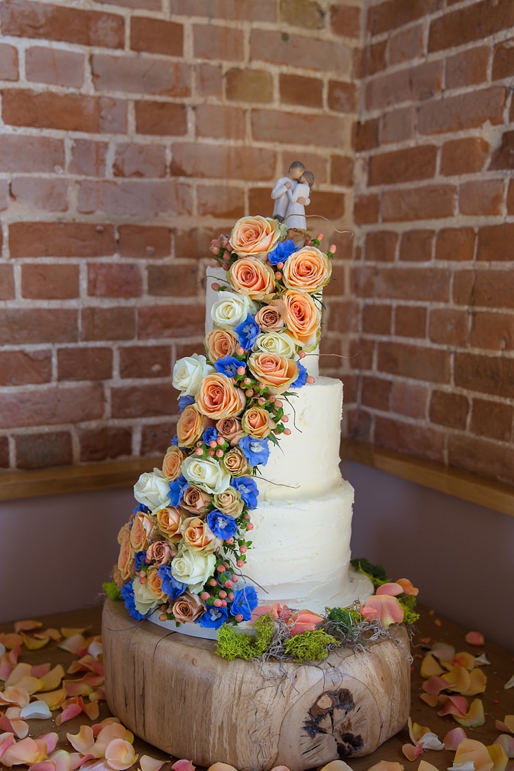 Butter Cream Cake Flowers Ivory Peach Blue Log Natural Soft Stylish Luxe Wedding http://www.katherineashdown.co.uk/