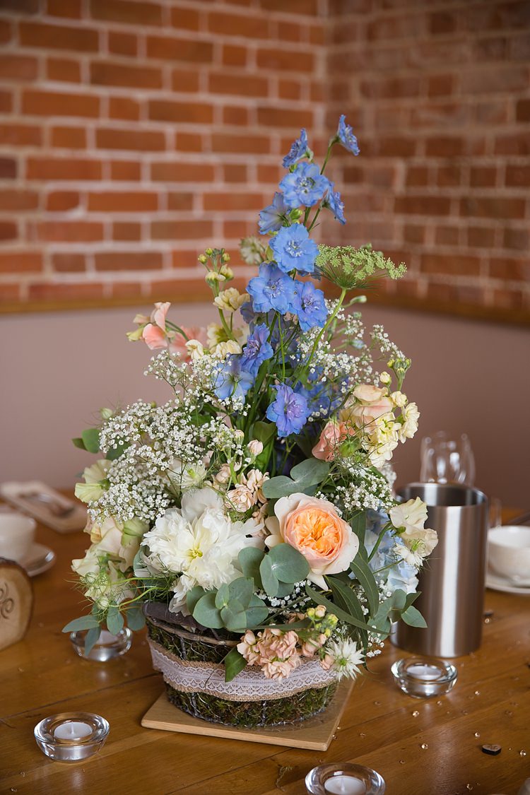 Peach Blue Ivory Flowers Centrepiece Log Natural Soft Stylish Luxe Wedding http://www.katherineashdown.co.uk/