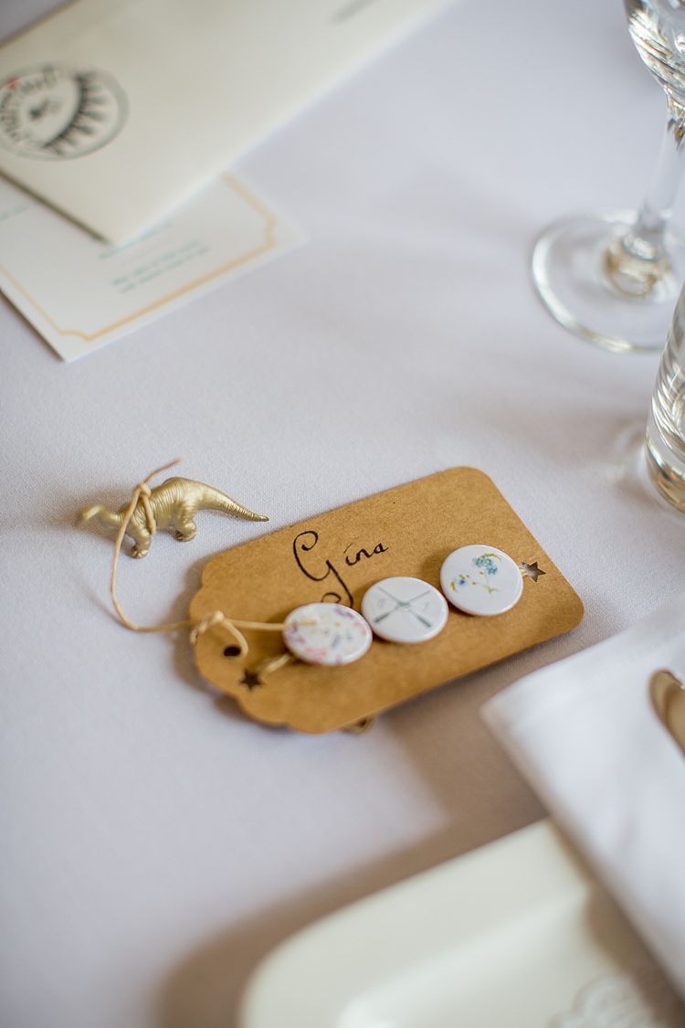 Dinosaur Badge Favours Luggage Tag Place Name Setting Floral Mustard Boathouse Wedding http://www.katherineashdown.co.uk/