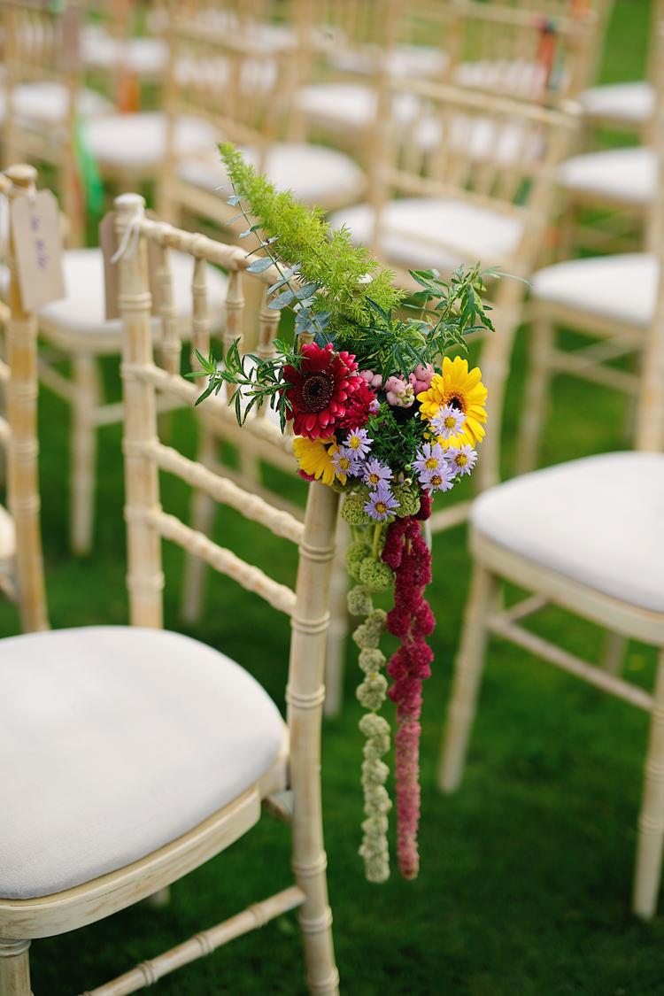 Pew Ends Chairs Aisle Flowers Draping Long Fresh Fun Rainbow Garden Wedding http://www.lydiastampsphotography.com/