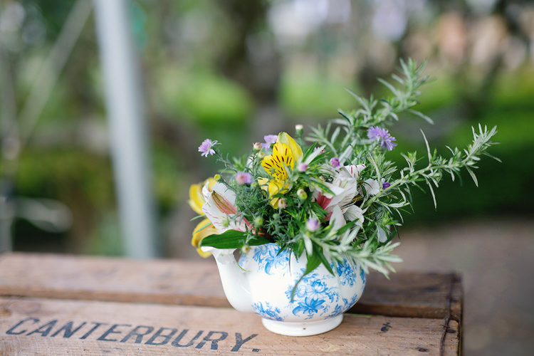 Tea Pot Flowers Fresh Fun Rainbow Garden Wedding http://www.lydiastampsphotography.com/