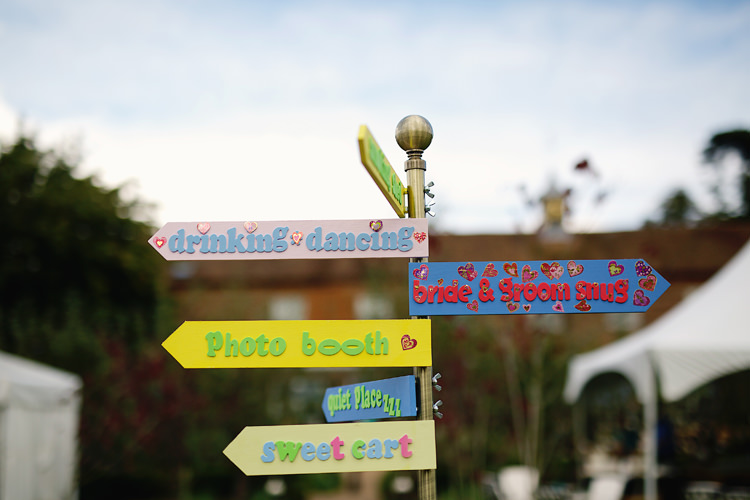 Direction Sign Post Fresh Fun Rainbow Garden Wedding http://www.lydiastampsphotography.com/