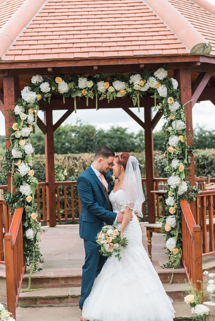 Flower Arch Ceremony Gazebo Outdoor Rustic Floral Peach Wedding http://www.folegaphotography.co.uk/