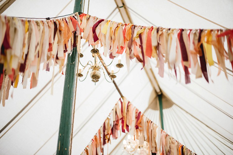 Rag Bunting Orange Coral Marquee Laid Back Bohemian Festival Wedding http://benjaminmathers.co.uk/