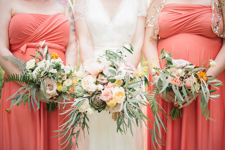 Bridesmaids Bouquets Flowers Coral Peach Yellow Whimsical Foliage Laid Back Bohemian Festival Wedding http://benjaminmathers.co.uk/