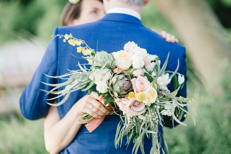 Whimsical Bouquet Flowers Foliage Roses Yellow Pink Bride Bridal Laid Back Bohemian Festival Wedding http://benjaminmathers.co.uk/