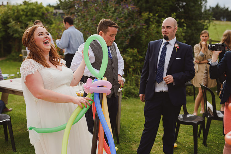 Balloon Modelling Fun Outdoorsy Farm Wedding http://www.samgibsonweddings.co.uk/