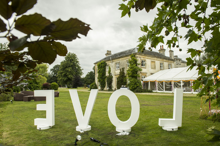 LOVE Letters Decor Fun Glittery Outdoor Colourful Wedding http://www.reportography.com/