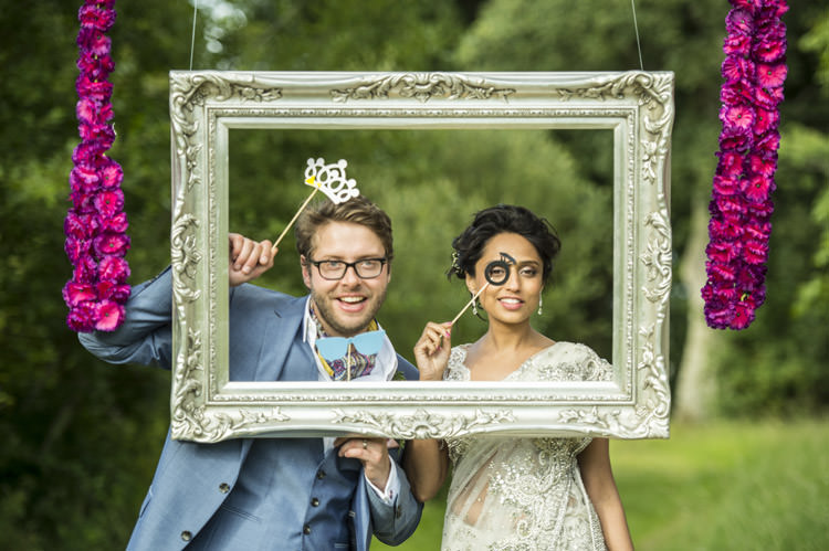 Photobooth Frame Props Fun Glittery Outdoor Colourful Wedding http://www.reportography.com/