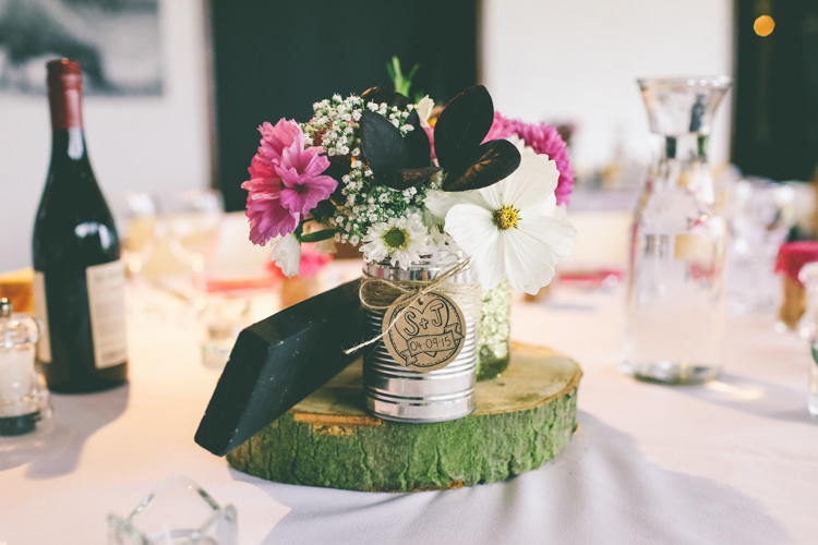 Tin Can Flowers Log Centrepiece Colourful Modern DIY Fun Wedding http://www.emmaboileau.co.uk/