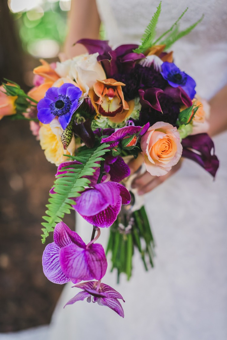 Bouquet Flowers Purple Orange Blue Orchid Bride Bridal Fantastical Woodland Renaissance Wedding in California http://www.milouandolin.com/