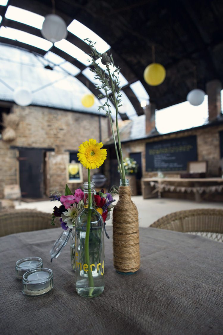 Twine Bottle Flowers Yellow Grey Rustic Farm Wedding http://assassynation.co.uk/