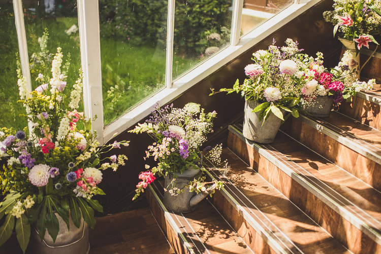 Bucket Flowers Beautiful Glass House Wedding http://www.mattpenberthy.com/