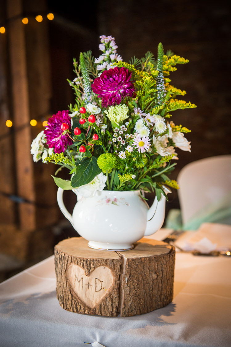 Tea Pot Flowers Log Stand Engraved Centrepiece Quirky Crafty Tea Infused Wedding http://jamesgristphotography.co.uk/