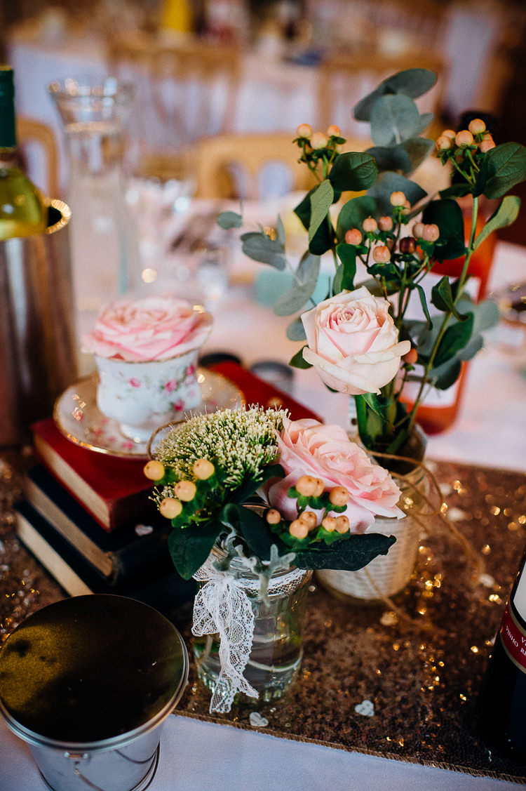 Flowers Jars Tea Cup Centrepiece Table Decor Books & History Sparkly Pastels Wedding http://www.mariannechua.com/