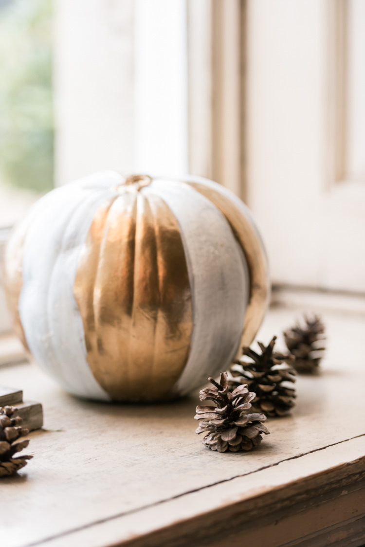 Painted Pumpkin Pinecone Decor Glamorous Gold Halloween Wedding http://www.oliviajohnstonweddings.co.uk/