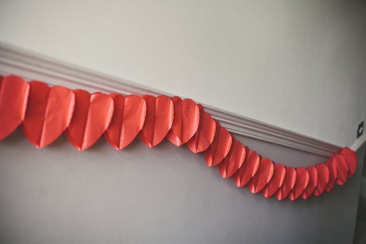 Red Heart Garland Quirky Alternative Lochside Wedding http://www.maureendupreez.com/
