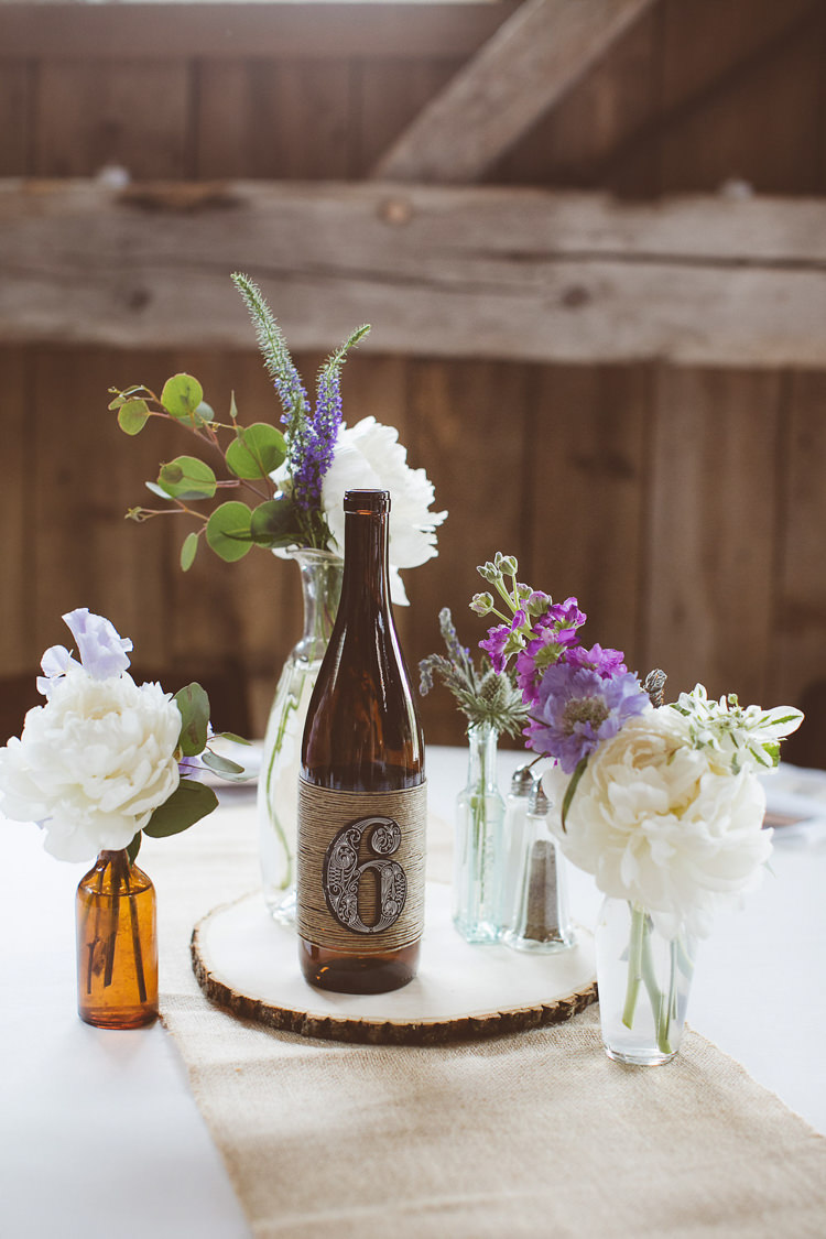 Bottle Flowers Centepiece Log Hessian Romantic Rustic Pastel Vineyard Wedding Massachusetts http://www.wonder-bliss.com/