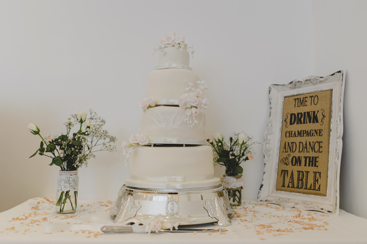 Iced Cake Flowers Dusky Pink Lace Fairy Lights Wedding http://www.abiriley.co.uk/
