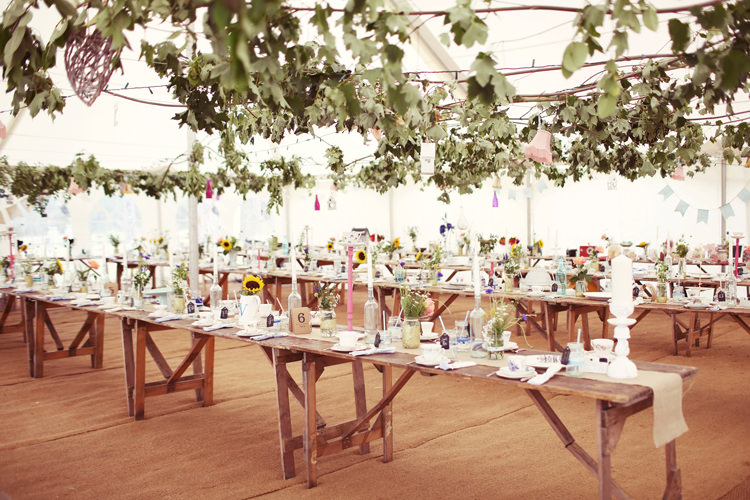 MArquee Long Tables Foliage Hanging Mismatched Fairground Woodland Wedding http://www.rebeccaweddingphotography.co.uk/