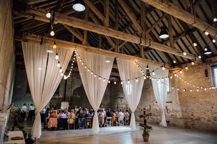 Riding School at Calke Abbey Barn Drapes Festoon Lights Natural Mismatched Home Made Wedding http://www.mattbrownphotography.co.uk/