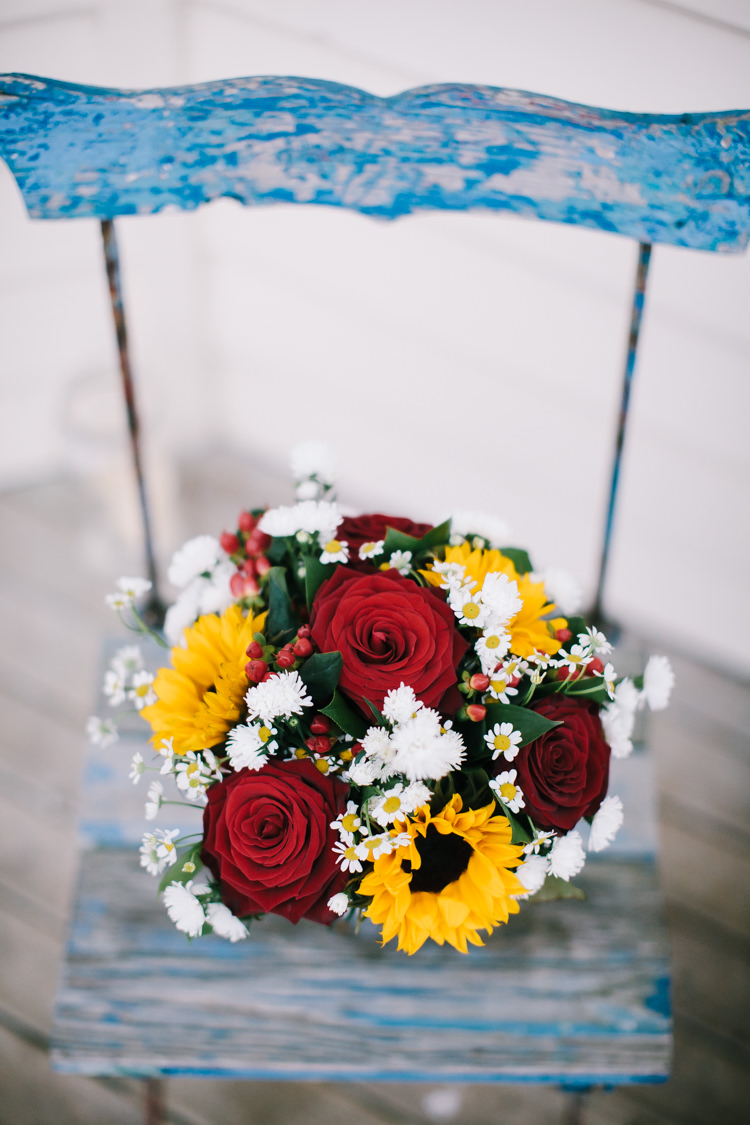 Bouquet Red Roses Sunflowers Daisies Bride Bridal Flowers Indie Secret Seaside Wedding http://www.chrisbarberphotography.co.uk/