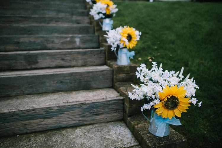 Jug Flowers Aisle Indie Secret Seaside Wedding http://www.chrisbarberphotography.co.uk/