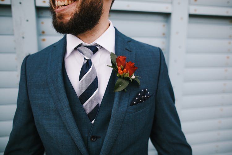 Red Rose Buttonhole Groom Indie Secret Seaside Wedding http://www.chrisbarberphotography.co.uk/