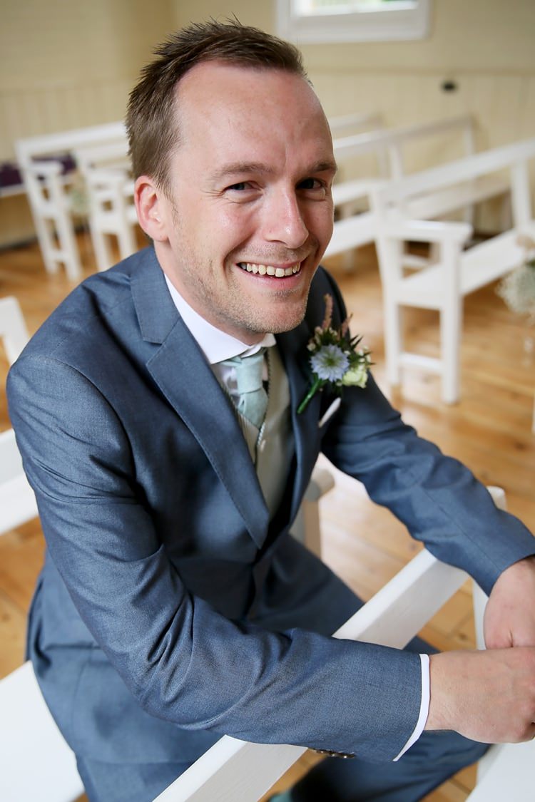 Blue Burton Suit Groom Sweet Pastel Village Hall Wedding http://www.helenstrongphotography.co.uk/