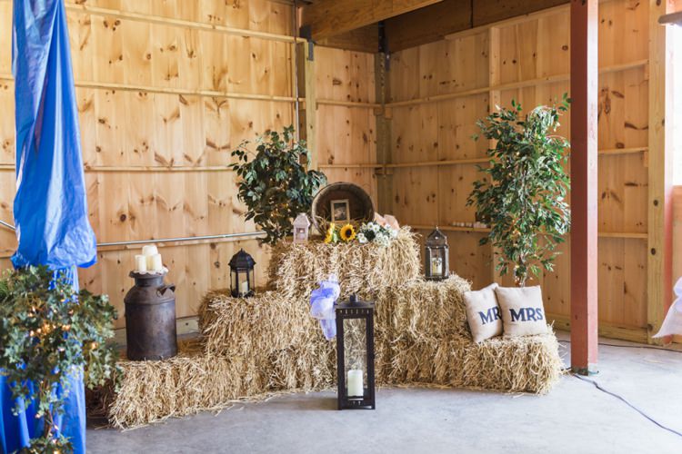 Sunflower Royal Blue Hay Decor Candles Rustic Country Barn Wedding in Tennessee https://www.sweetlyvintage.com/