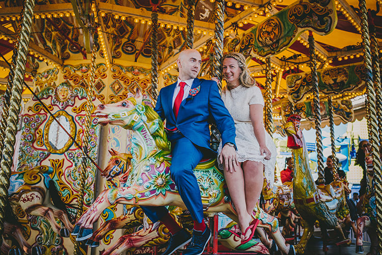 Fair Ground Bride Groom Ride Intimate Red Seaside Brighton Wedding http://www.jmcsweeneyphotography.co.uk/