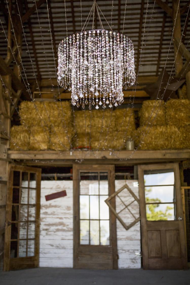 Hanging Chandelier Hay Bales Rustic Decor Reception Country Farm Barn Wedding Ohio http://www.caseyclarkphotography.net/