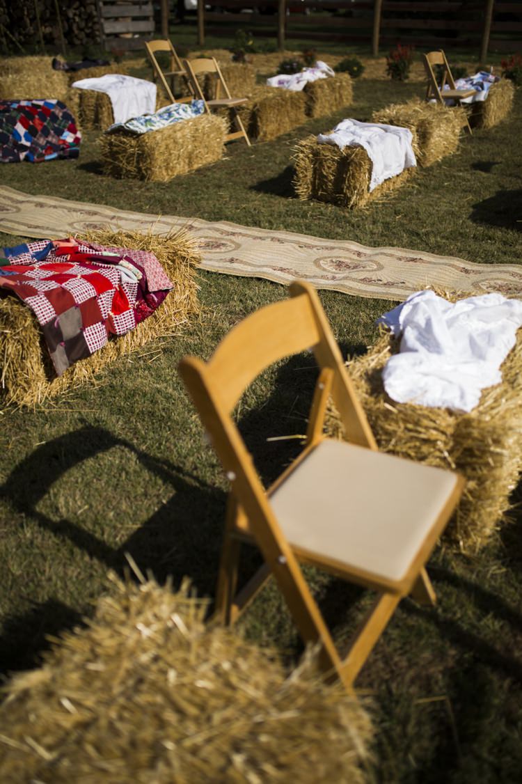 Outdoor Ceremony Seating Hay Bales Colourful Blankets Country Farm Barn Wedding Ohio http://www.caseyclarkphotography.net/