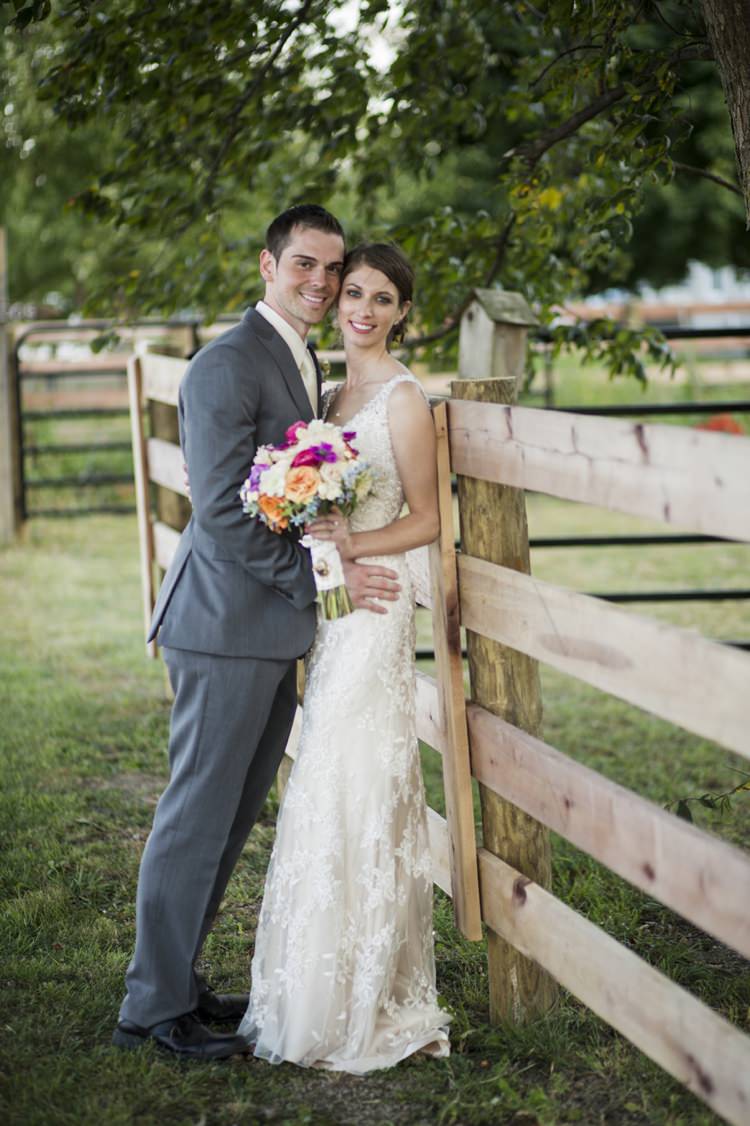 Outdoors Trees Fence Groom Bride Colourful Bouquet Lace Bridal Gown Country Farm Barn Wedding Ohio http://www.caseyclarkphotography.net/ 