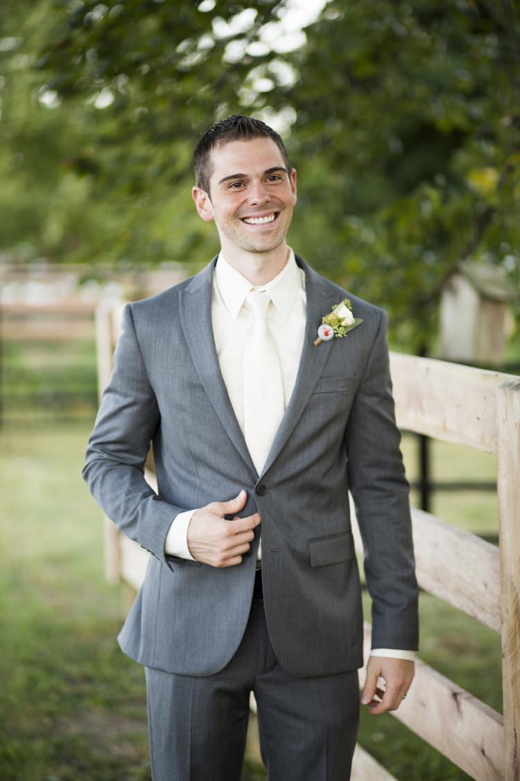 Grey Suit White Tie Buttonhole Rose Greenery Bottle Cap Groom Style Country Farm Barn Wedding Ohio http://www.caseyclarkphotography.net/