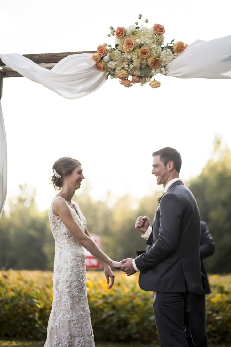 Outdoor Ceremony Arch Flowers Peach Roses White Tulle Bean Field Country Farm Barn Wedding Ohio http://www.caseyclarkphotography.net/