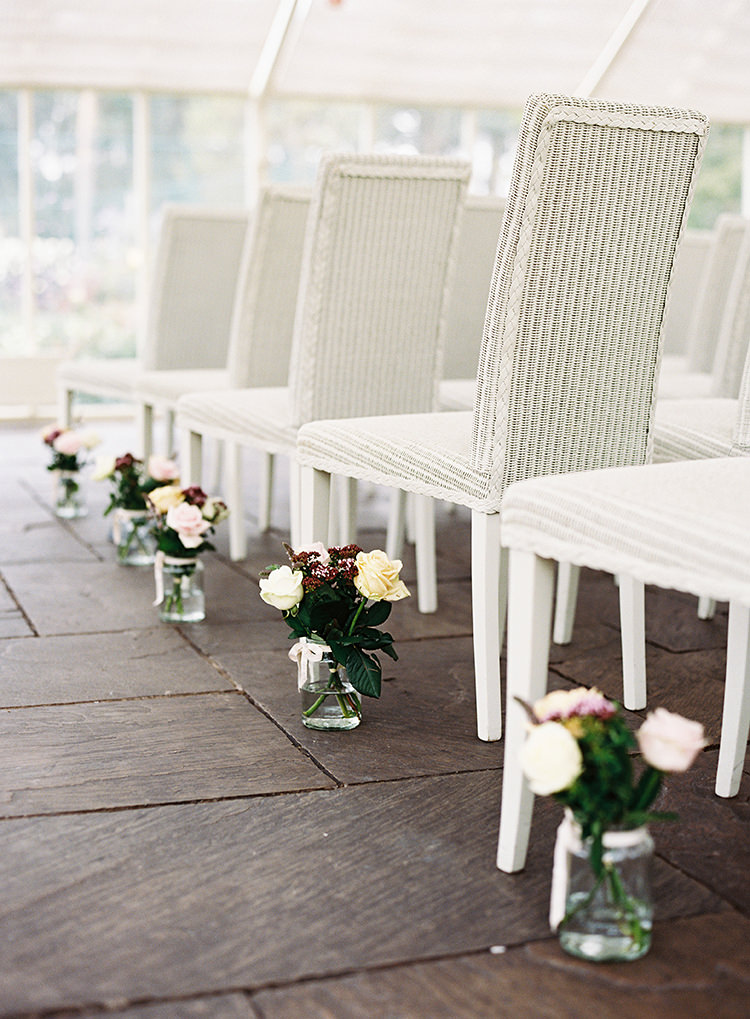 Aisle Jar Flowers Ceremony Chairs Pretty Floral Wonderland DIY Wedding http://www.victoriaphippsphotography.co.uk/