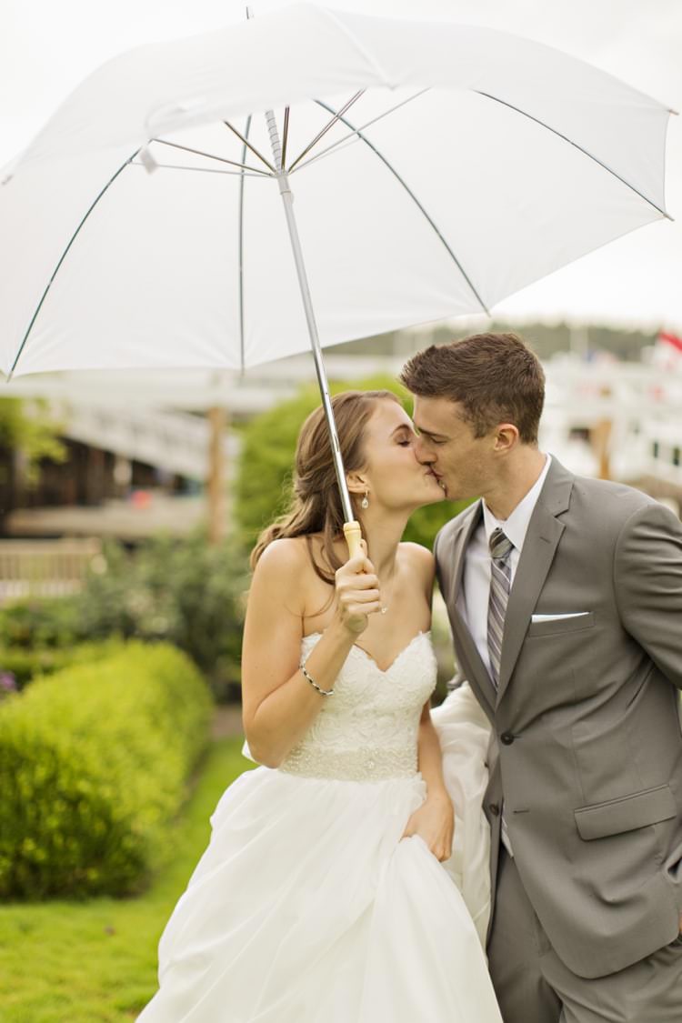 Bride Groom White Umbrella Kiss Strapless Sweetheart Bridal Gown Grey Suit Grey Stripe Tie Elegant Classic Outdoor Wedding Washington http://www.courtneybowlden.com/