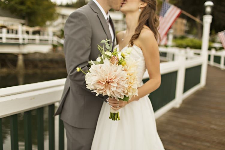 Bride Flowers Peach Pink Dahlia Bouquet Groom Grey Suit Roche Harbor Resort Elegant Classic Outdoor Wedding Washington http://www.courtneybowlden.com/
