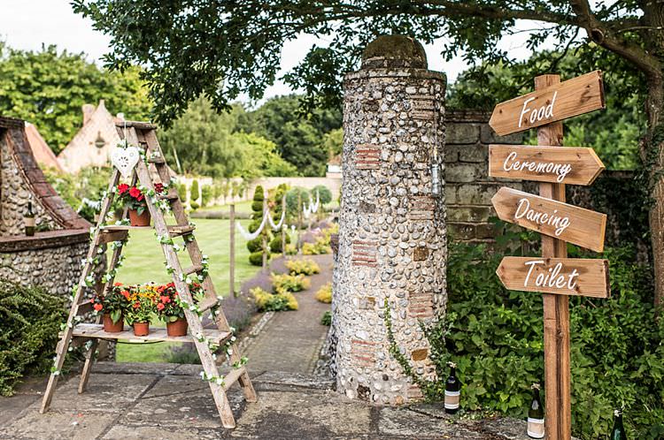 Ladder Decor Flowers Rustic Sign Wooden Post Outdoor Festival Summer Wedding http://lighteningphotography.co.uk/