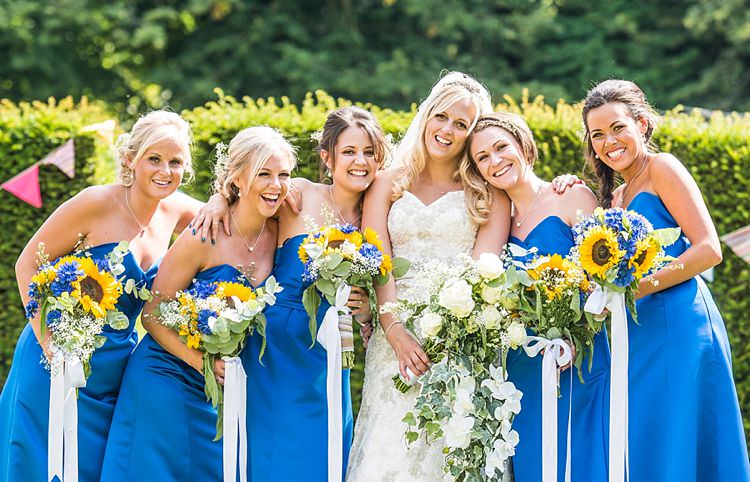 Blue Bridesmaid Dresses Ribbon Sunflower Bouquets Outdoor Festival Summer Wedding http://lighteningphotography.co.uk/